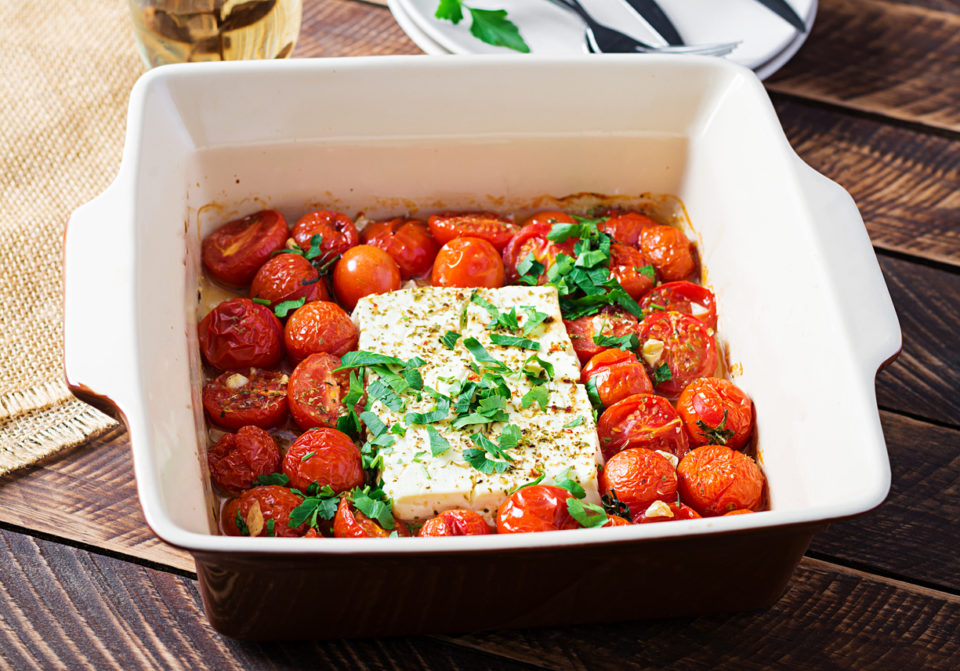 Feta bake pasta recipe made of cherry tomatoes, feta cheese, garlic, and herbs.